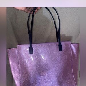 Pink glitter Kate spade tote. Also has matching full size wallet that comes